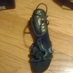 New York Transit black strappy about 2 inch heel. Micro suede.